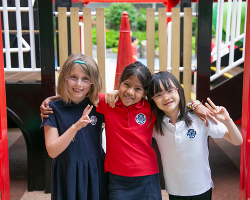 LP Students Smiling on Playground